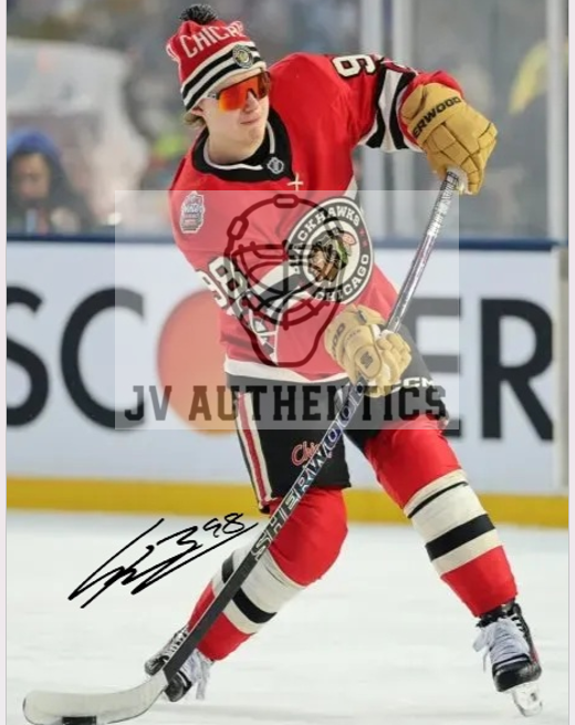 8x10 Connor Bedard Player Print with Facsimile Autograph.